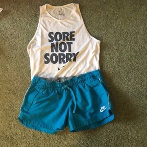 Dark blue Nike running shorts (SZ: 12 to 14)